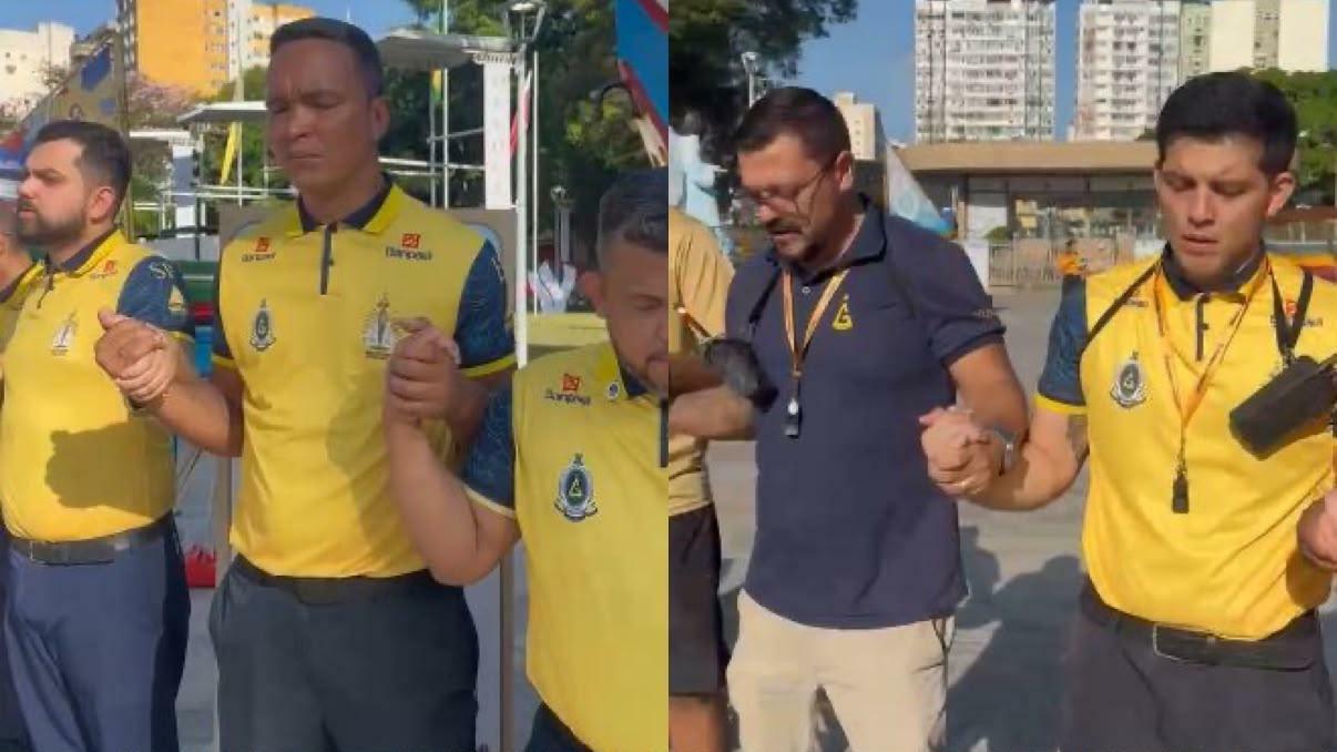 A imagem em destaque mostra o momento de oração dos guardas de Nazaré na Praça Santuário, em Belém.